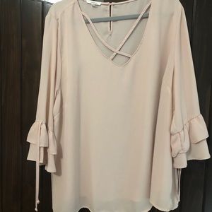 Lt Pink top, ruffle sleeves, detailed V-neck
